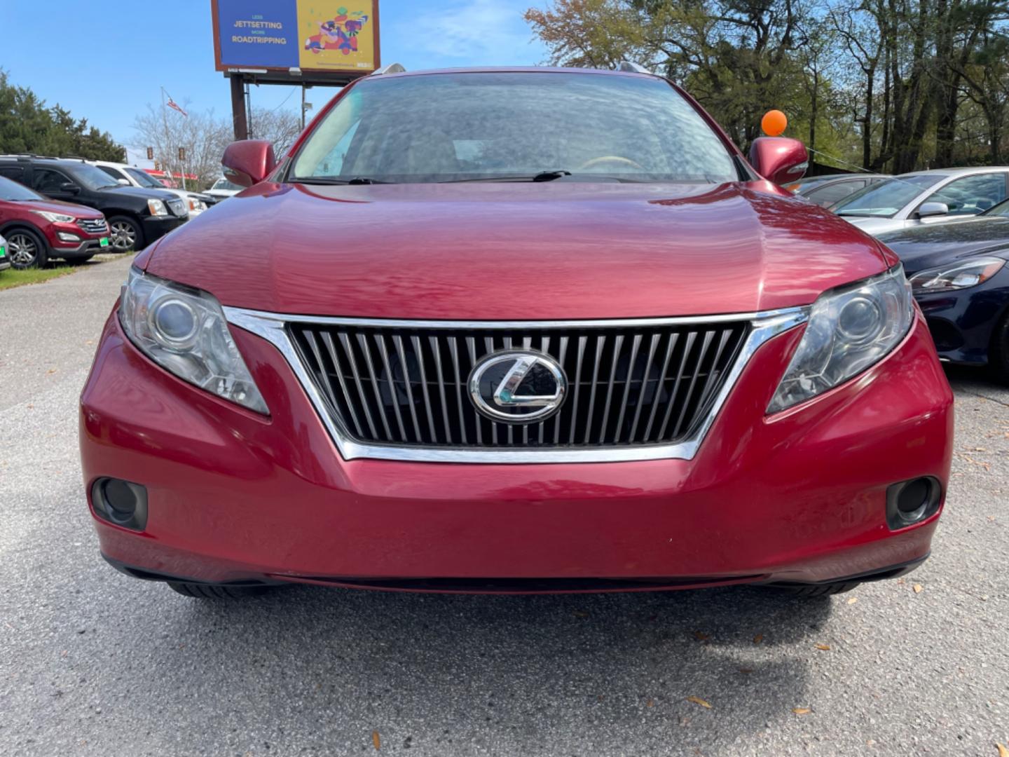 2010 RED LEXUS RX 350 BASE (2T2ZK1BAXAC) with an 3.5L engine, Automatic transmission, located at 5103 Dorchester Rd., Charleston, SC, 29418-5607, (843) 767-1122, 36.245171, -115.228050 - Super clean interior with Leather, Sunroof, 6-disc CD/AUX/Sat, hands-free Phone, Dual Climate Control, Power Everything (windows, locks, seats, mirrors), Heated/Cooled/Memory Seating, Push Button Start, Keyless Entry, Alloy Wheels. Clean CarFax (no accidents reported!) 108k miles Located at New Lif - Photo#1